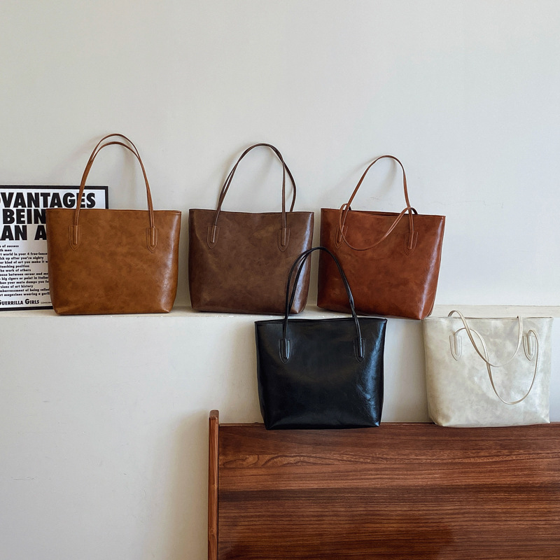 Bolso retro de gran capacidad para mujeres 2024 nueva moda coreana nicho bolso especial universal simple bolso axilar de hombro