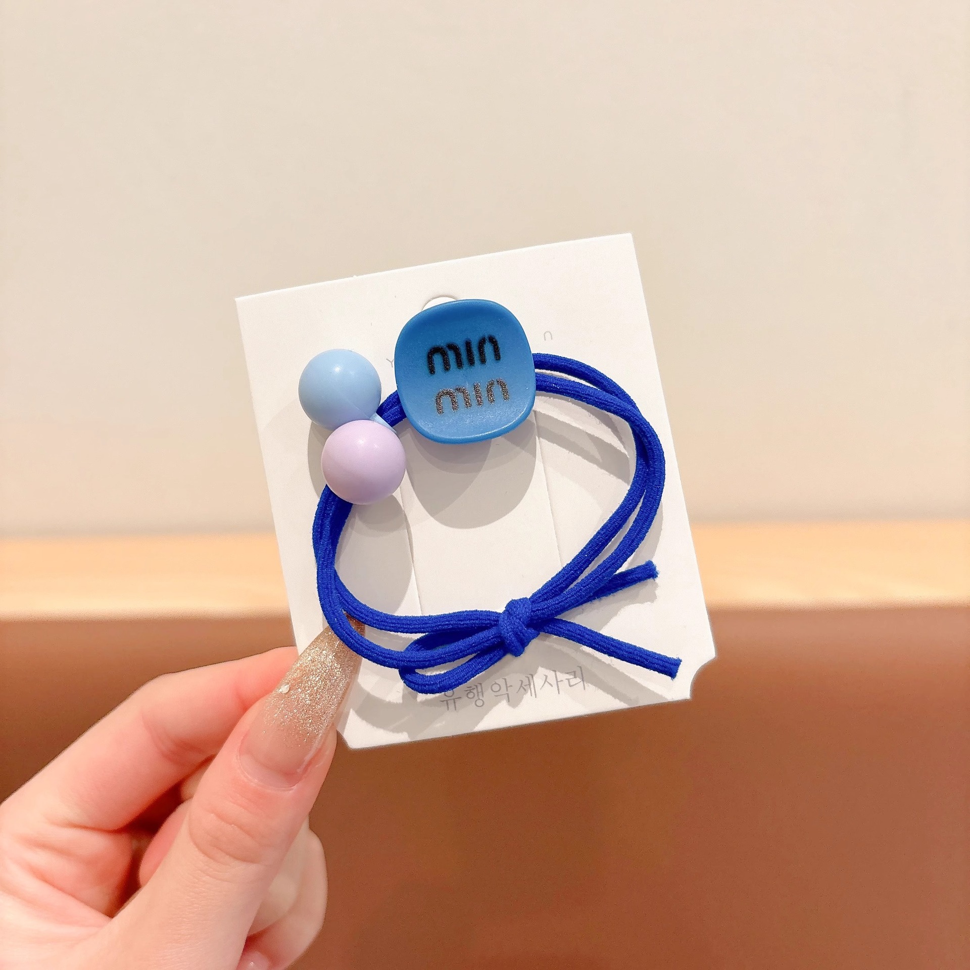 2025 nueva mariposa cuerda de cabello niñas atadas bolas correa de cabello no daña cabello alto valor de la cara cuerda de cabello joyería para el cabello de niña