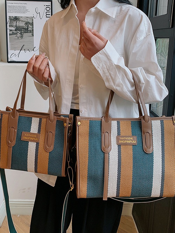 Bolso Tote portátil a rayas de color de contraste de lona para mujer 2024 nueva textura de moda transfronteriza bolso de mensajero de un solo hombro