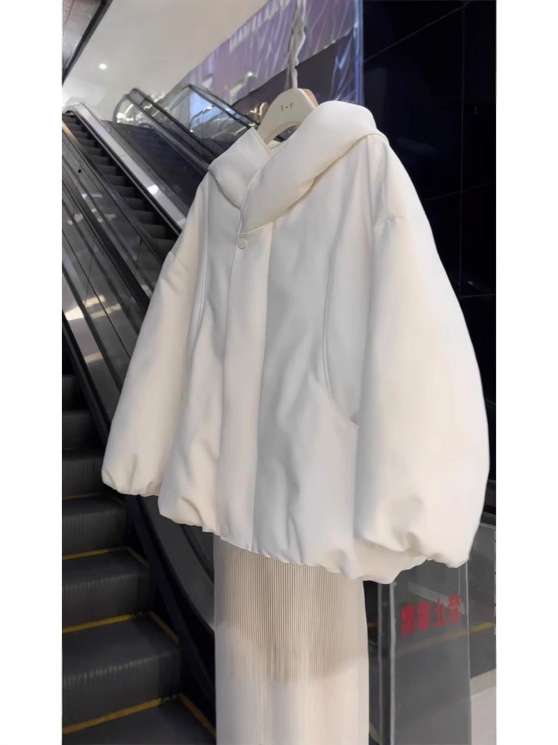 Copas de algodón blancas cortas y gruesas para mujeres en invierno de 2026 nueva moda extranjera alta sensación de super hermosa chaqueta cálida