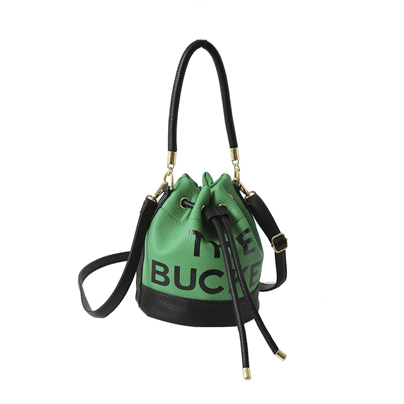 Bolso de hombro femenino casual todo-fósforo diseño de nicho sentido contraste color costuras cubo bolso de mano moda tendencia bandolera