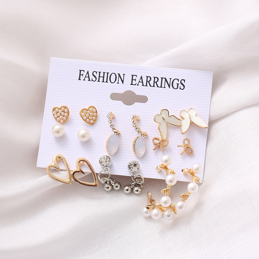 Fashion Heart Shape Bow Knot Alloy Inlay Artificial Pearls Zircon Women's Drop Earrings Ear Studs 1 Set display picture 3