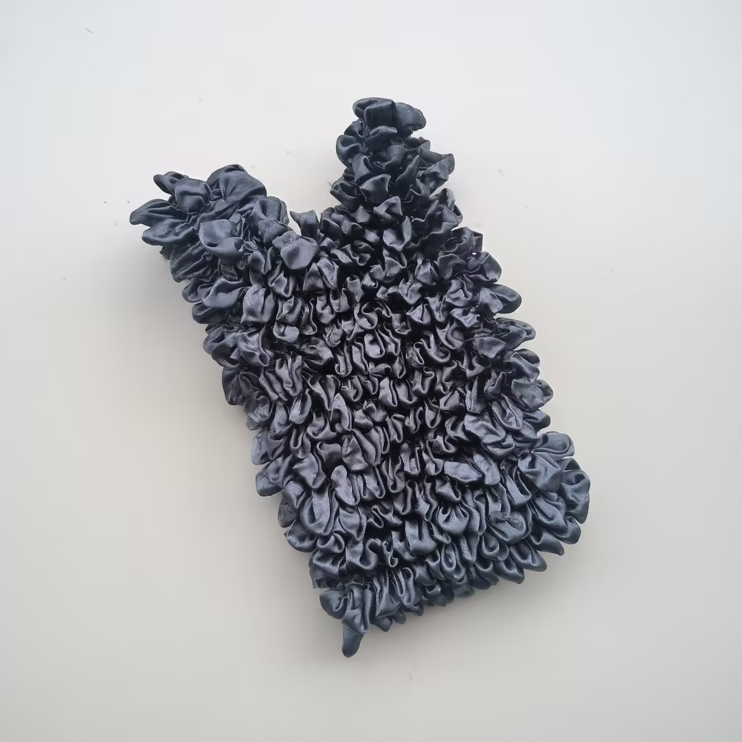 Bolso de burbuja multiusos popular de gran capacidad de la celebridad de Internet de las mujeres Bolso de burbuja japonés y coreano nuevo bolso mágico bolso telescópico bolso plisado