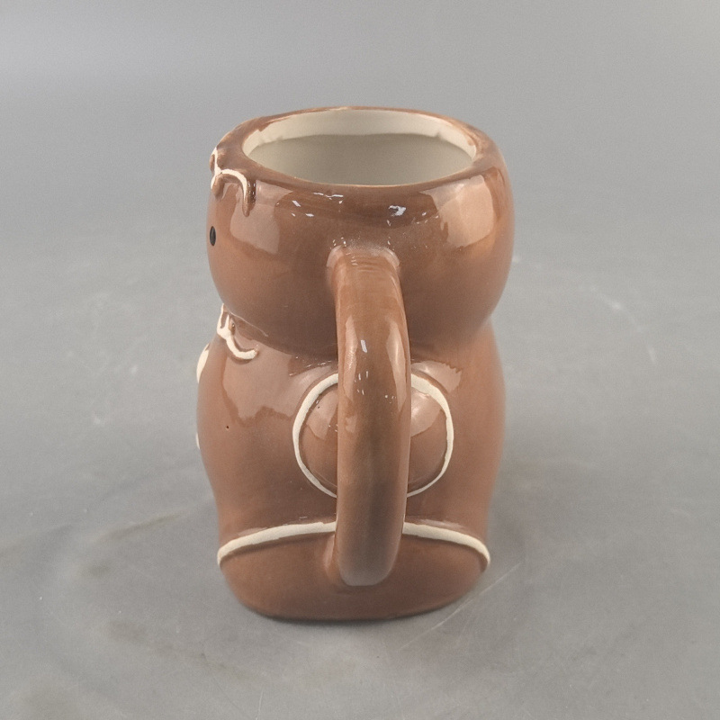 Navidad spot pan de jengibre hombre taza de cerámica decoración en relieve creativa taza de cerámica de dibujos animados taza de jengibre hombre en relieve taza