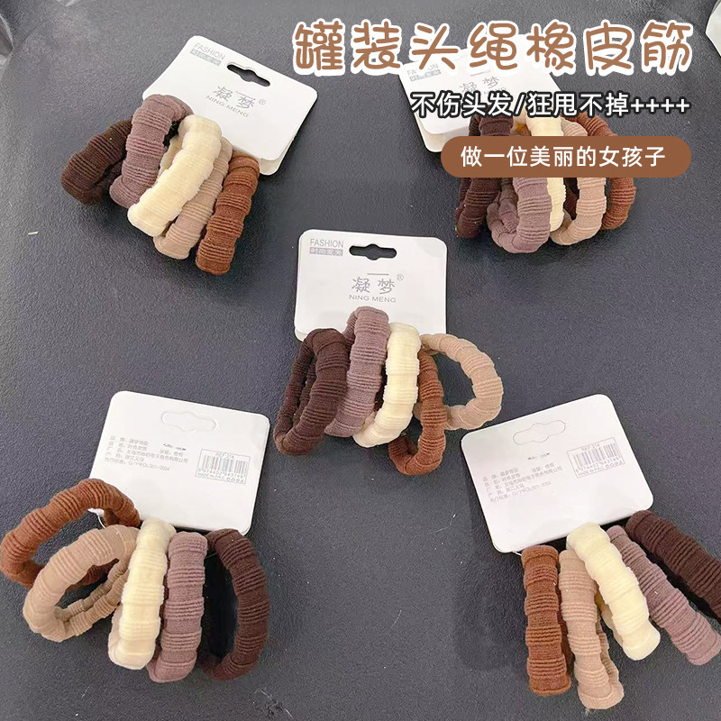 耐久性のある缶のひものゴムバンドの女性は、髪のひもを刺して高い馬尾の髪を刺します。|undefined