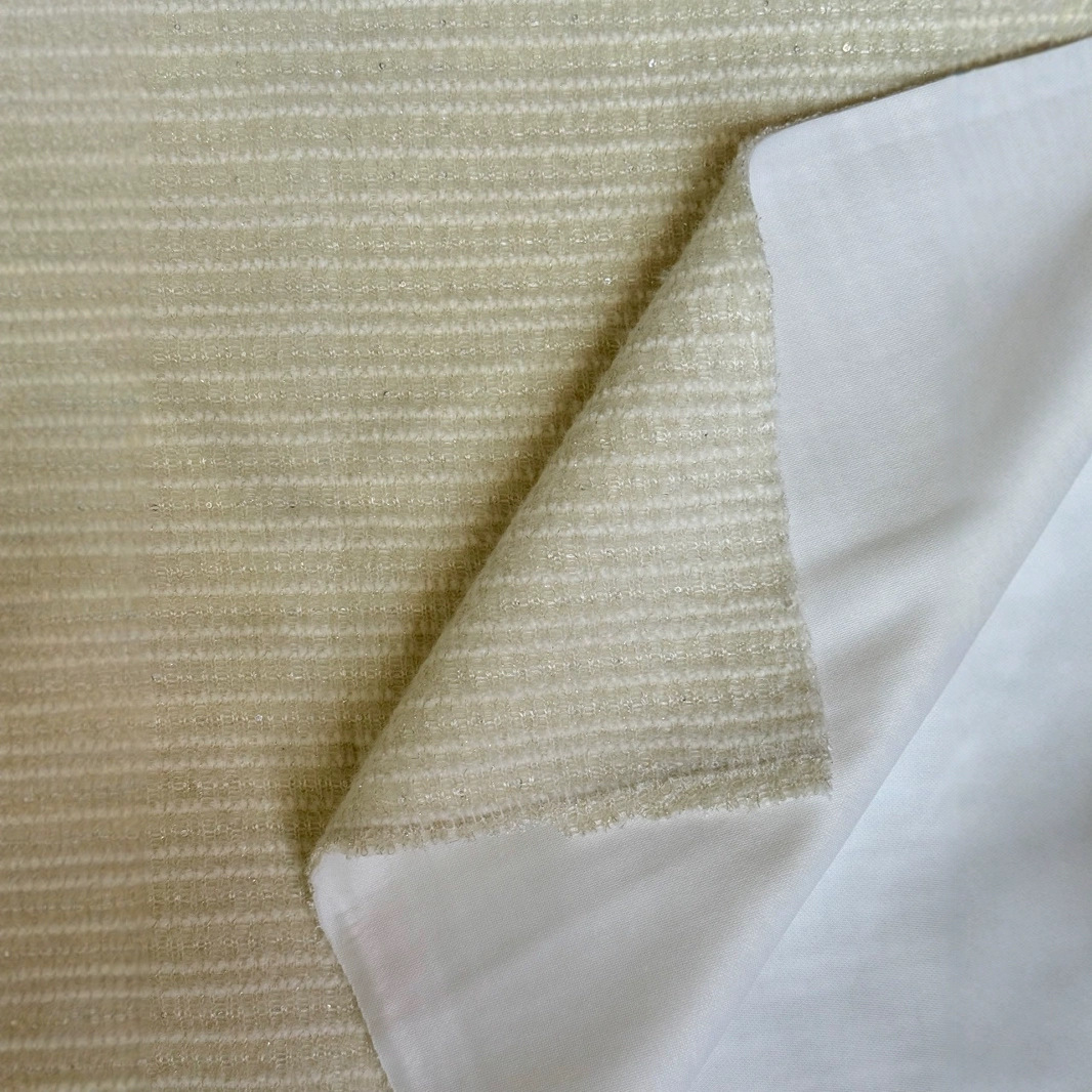 2025新品供应针织金丝亮片针织复合成品女装面料羽绒服套装外套