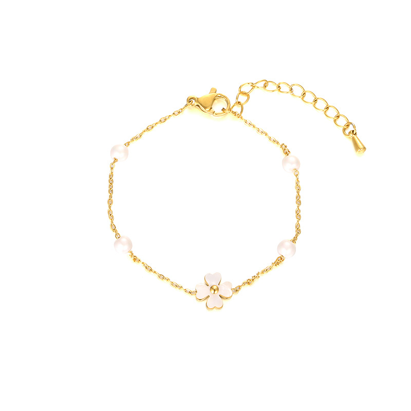 Estilo japonés y coreano Luz de lujo INS de moda Concha perla pulsera hembra mariposa trébol personalidad todo fósforo pulsera de acero inoxidable