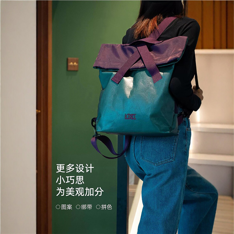 Custom DuPont paper bags with printed logo and pattern, custom cultural and creative backpack tote bags, corporate onboarding gift packaging Custom DuPont paper bags with printed logo and pattern, custom cultural and creative backpack tote bags, corporate onboarding gift packaging