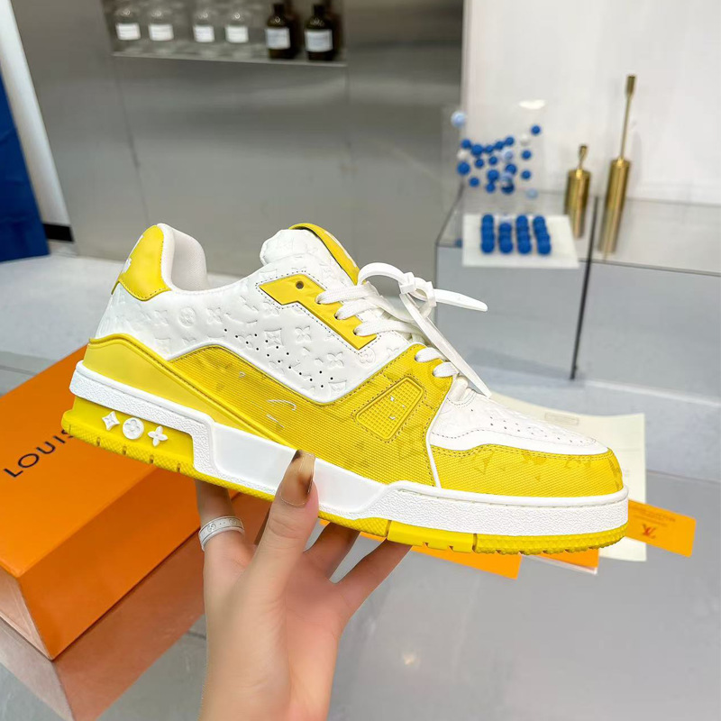 Zapatos de moda europeos Guangzhou de alta versión驴 entrenador zapatos deportivos ociosos de cuero universal para hombres y mujeres