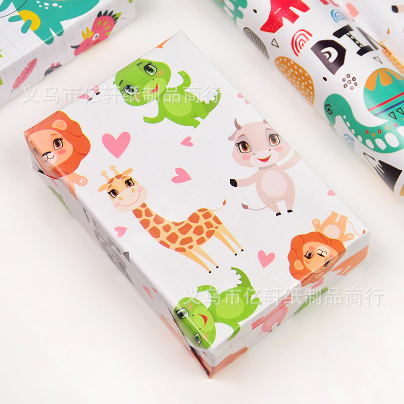 Papel de regalo transfronterizo Nuevo Día del Niño caja de regalo de cumpleaños papel de regalo lindo dinosaurio animal de dibujos animados