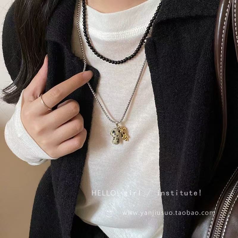 Black and white mushroom necklace