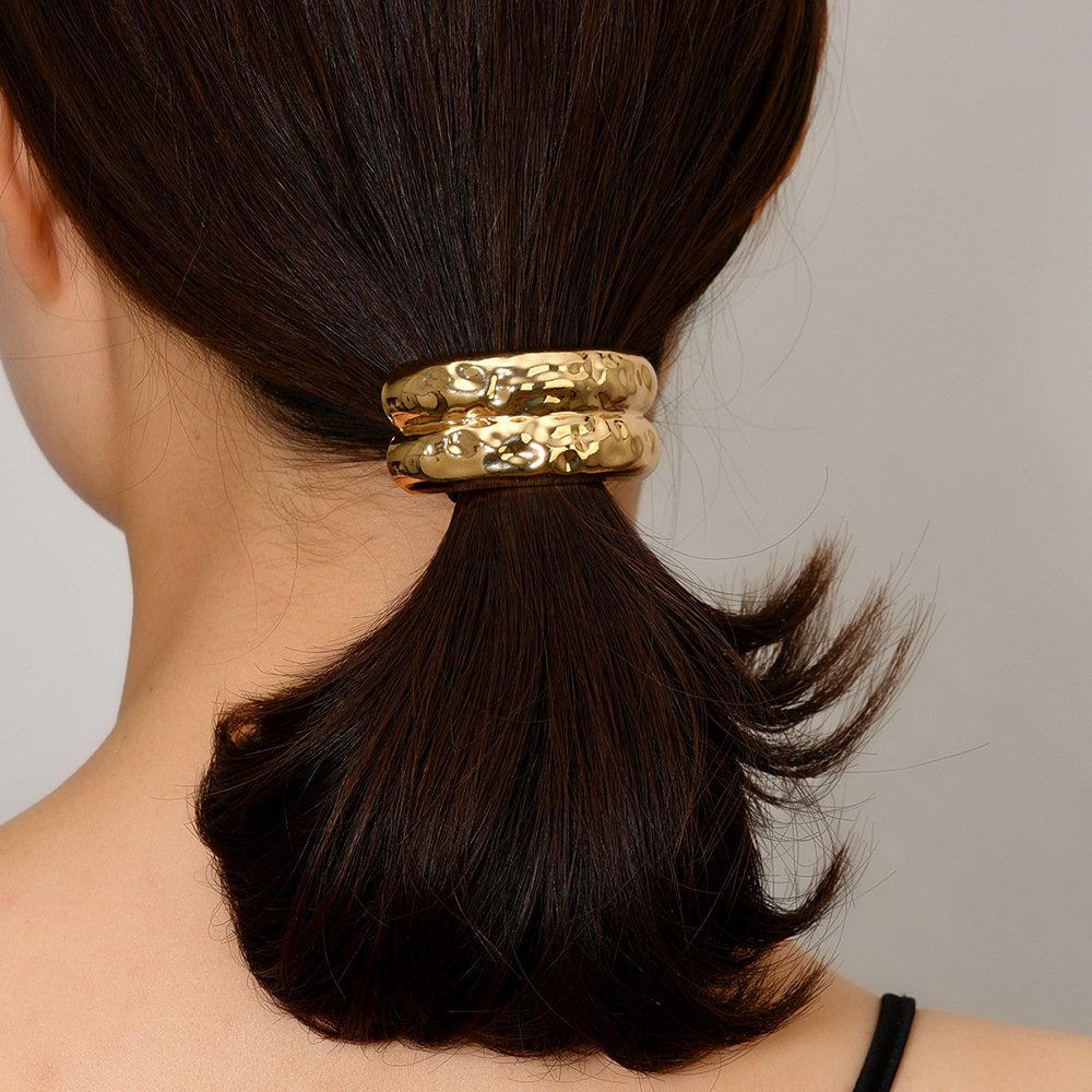 Viento frío europeo y americano, metal geométrico, anillo para el cabello elástico cóncavo y convexo, nuevo anillo para el cabello líquido de temperamento, cuerda para el cabello de alta elasticidad de todo fósforo