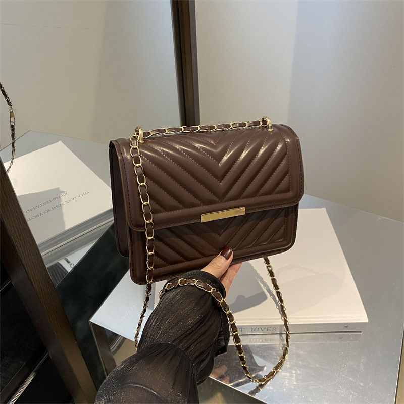 Este año, la nueva tendencia de alta calidad de la cadena de diamante, bolsos cuadrados, bolsos de moda de hombro simple, bolsos de mujer.