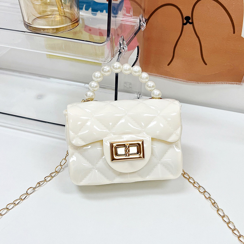 Bolso de los niños 2023 nuevo mini bolso de La jalea rombo estilo occidental pequeña bolsita Perla hombro crossbody bolsa de la cadena portátil