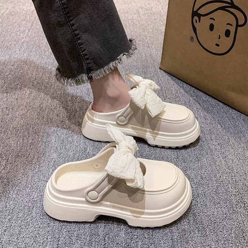 Тапочки женский летний бант 2025 новый высокий нескользкие холодные тапочки носить толстую подошвую половину тапочки оптовая продажа