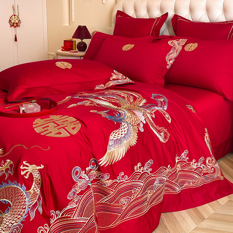 Una clase de madres y bebés de algodón de boda cuatro piezas grandes sábanas bordadas rojas chinas cubierta de cama de boda