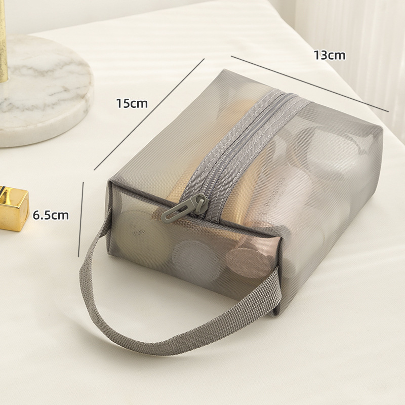 Nueva bolsa de cosméticos transparente de gran capacidad en el mercado, bolsa de lavado de viaje, bolsa de almacenamiento portátil de nailon portátil simple y portátil