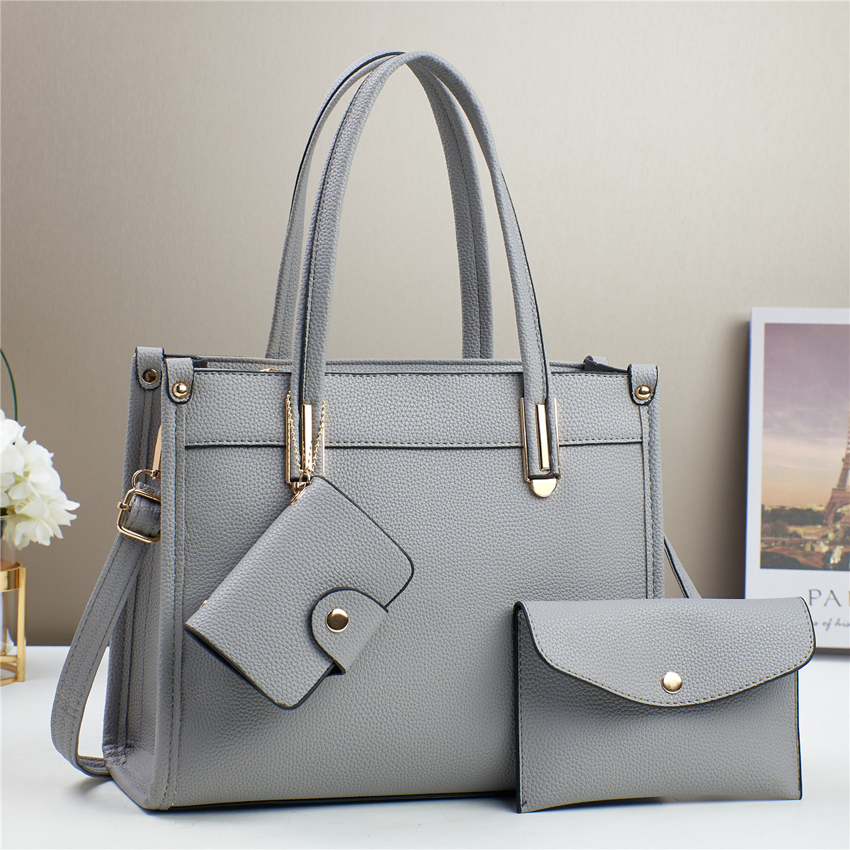 Fabricantes bolsos de comercio exterior mujeres 2025 nuevo bolso de mano mano textura de hombro liso inclinado bolso de moda de mujer coreana