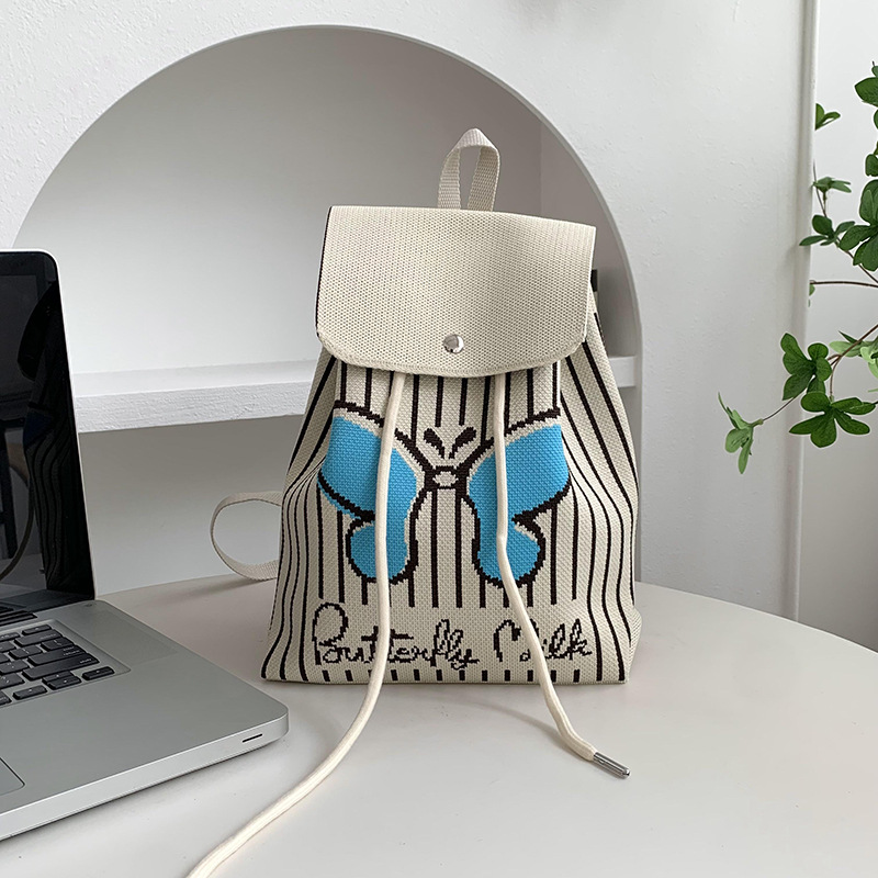 Mochila de alta calidad para damas nueva personalidad de dibujos animados versátil de gran capacidad de viaje bolsa de tejido portátil mochila de punto