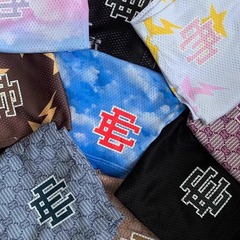 アメリカの潮のエックマヌエルEE print shotsプリントのロゴのスポーツのズボンのメッシュのひものショートパンツ