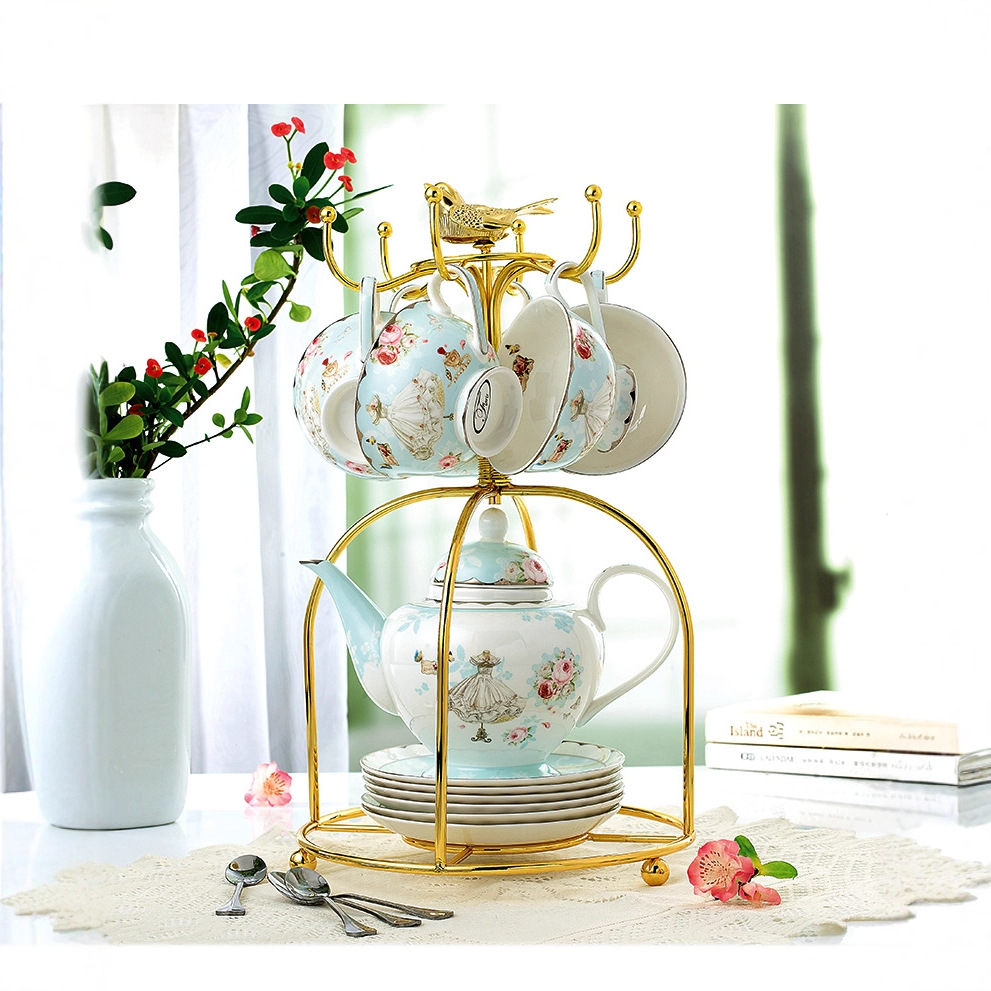 Estilo europeo de oro borde hueso China de alta apariencia taza de café traje nórdico hogar británico tarde juego de té traje al por mayor
