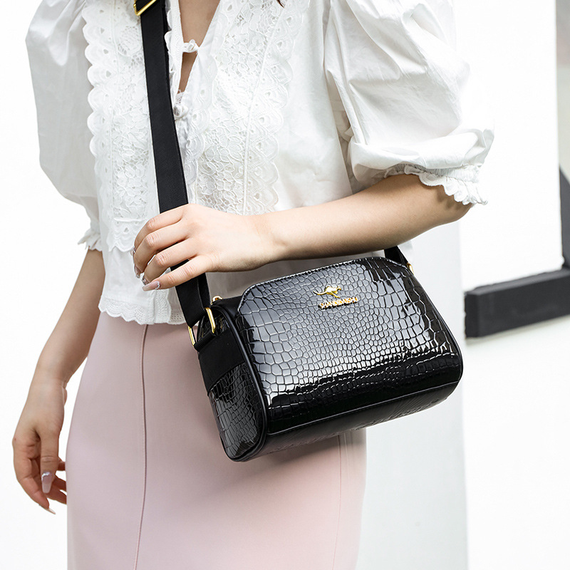 Nueva bolsa de moda para mujeres, bolsa de cremallera de moda, bolsa de madres de mediana edad, bolsa de cuero suave, bolsa de hombro inclinada.