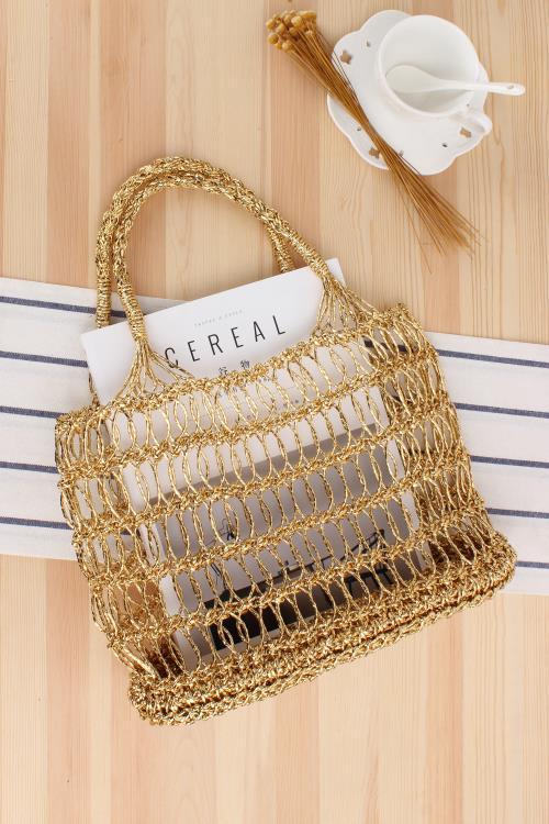 Women's Medium Plastic Paper Solid Color Beach Classic Style Weave Hollow String Beach Bag display picture 5