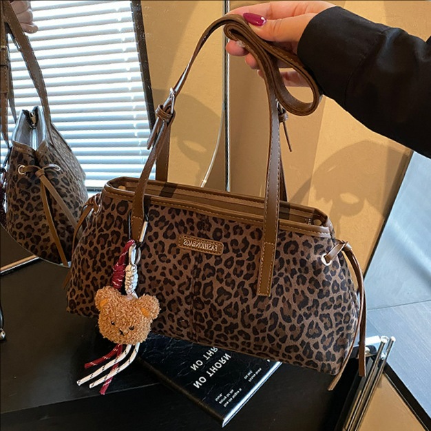 Invierno retro estampado leopardo hombro brazo bolso de gran capacidad para mujeres 2025 nueva bolsa de mano de viaje ocio