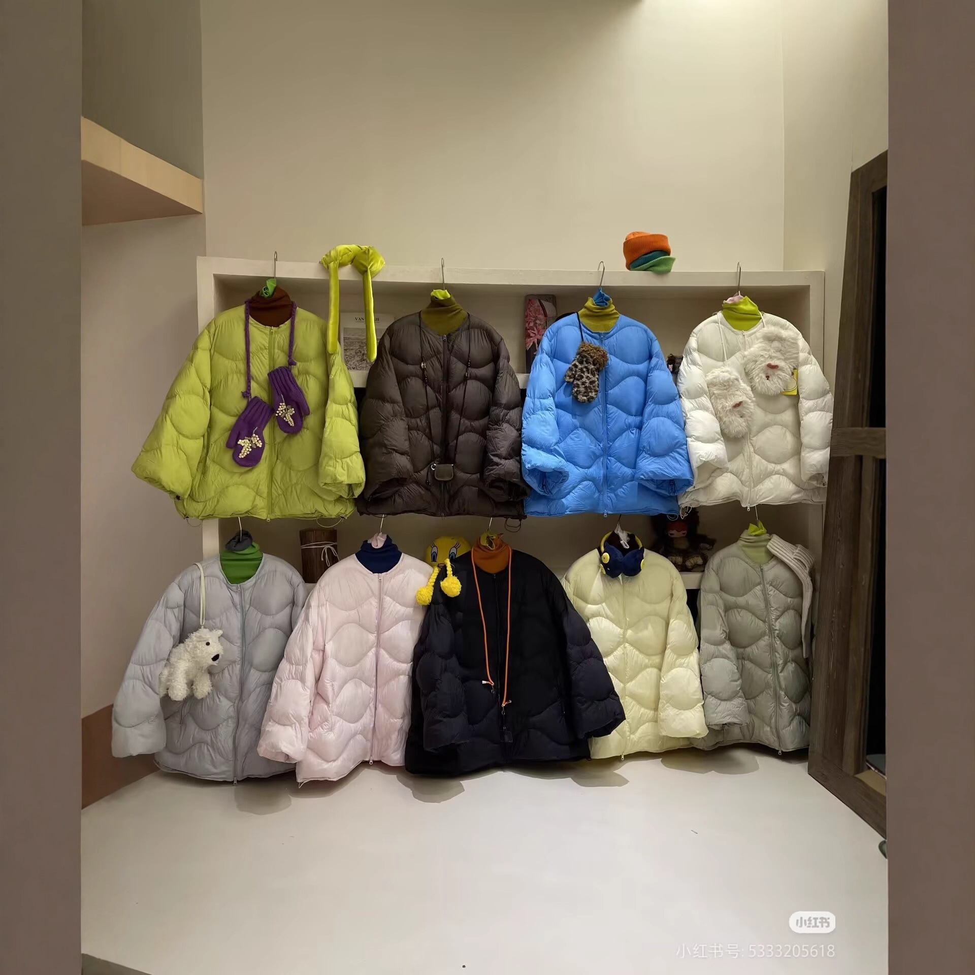 山茶花2025冬季韩版今年流行90白鸭绒压格羽绒服女中长款加厚外套