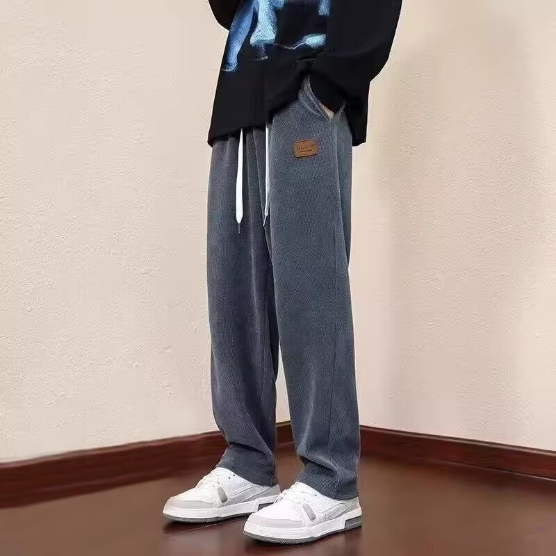 Pantalones casuales de cordillera para hombres otoño y invierno recto colgando pantalones de moda sueltos y pantalones deportivos de cordillera gruesos para hombres
