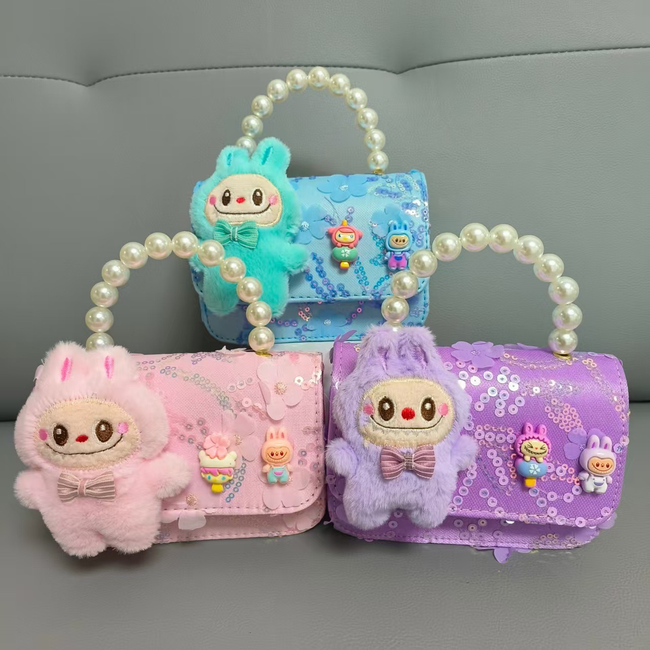 2025 nuevo bolso de perlas para niños bolso de cinturón con cuentas bolso de Año Nuevo para chicas bolso de muñecas accesorios bolso pequeño viento fragante