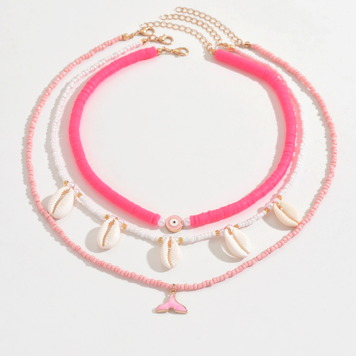 Colar em camadas estilo boho com pingente de coração e concha_voghion.com