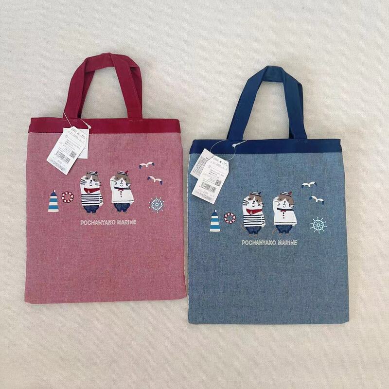 Japanese Embroidered Navy Cat Fabric Handbag iPad Bag Tutoring Bag Hand Bag Shopping Shopping Bag Cartoon 838 Japanese Embroidered Navy Cat Fabric Handbag iPad Bag Tutoring Bag Hand Bag Shopping Shopping Bag Cartoon 838