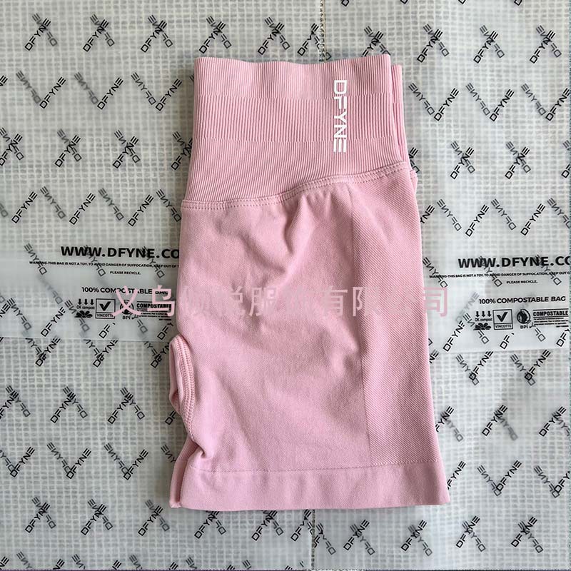 Aliexpress nuevo DFYNE mangas cortas mate nylon alta elástica cuerpo apretado sin bordas de acondicionamiento deportivo T mangas cortas