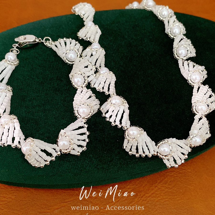 Temperamento retro collar de perlas de lujo ligero nicho de alta sensación de cadena de clavícula accesorios de vacaciones conjunto de joyería al por mayor