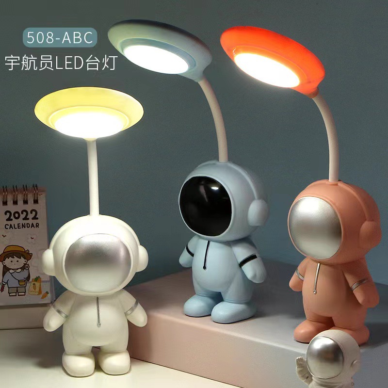 Creative cartoon children's desk lamp for back-to-school students, eye-protection study night light, activity small gift, printed, with gift bag included.