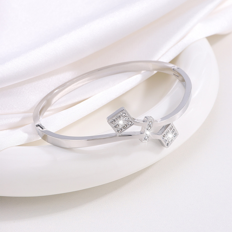 Brazalete de acero de titanio Waffle Personalidad no se desvanece Brazalete de diamantes de mujer abertura de pareja de alto nivel Brazalete de acero inoxidable