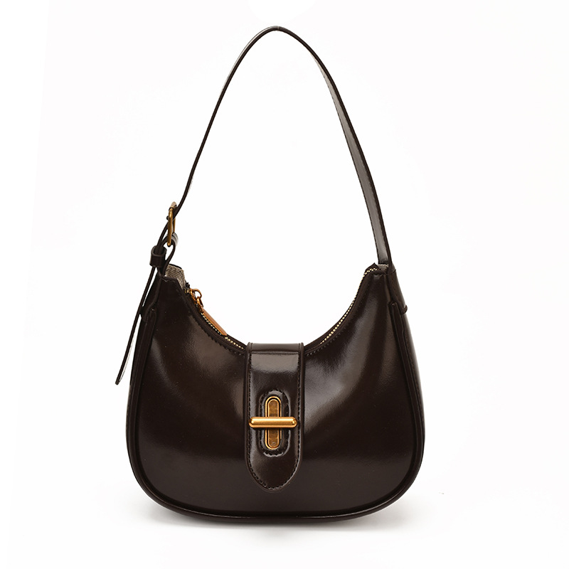 Bolso de brazo de moda de alto nivel, bolso de hombro de alta calidad, nuevo estilo de mujer 2026 simple, bolso de hombro de alta calidad, bolso de transporte universal.