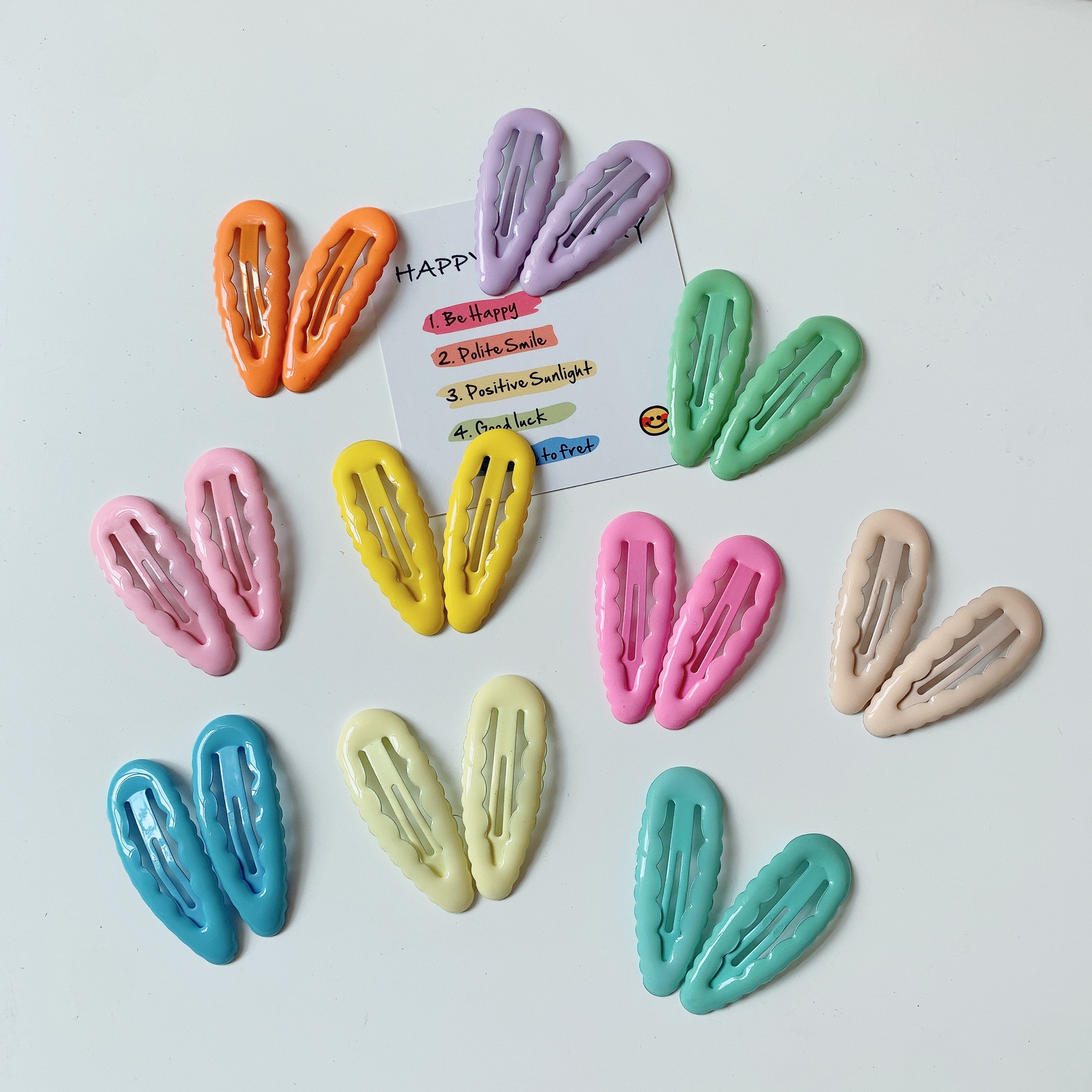 Wavy children's hairgrip drop-shaped