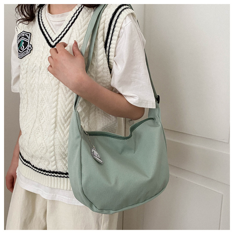 Large capacity canvas shoulder for women in spring summer 2023, new solid color, simple and fashionable casual bag,_voghion.com