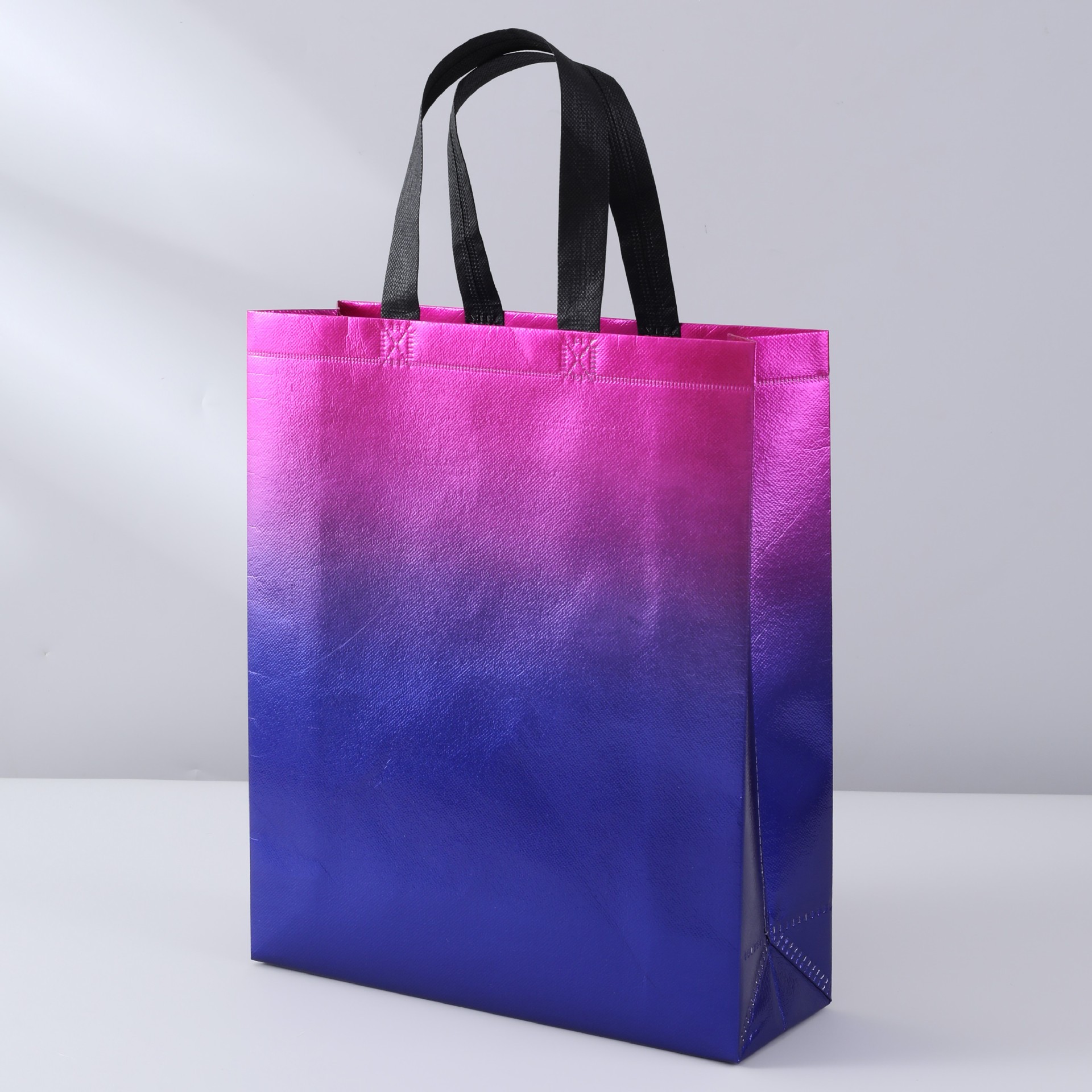 Láser laminado ropa bolsa de embalaje de regalo multicolor no tejido bolsa de publicidad bolso de compras logotipo imprimible