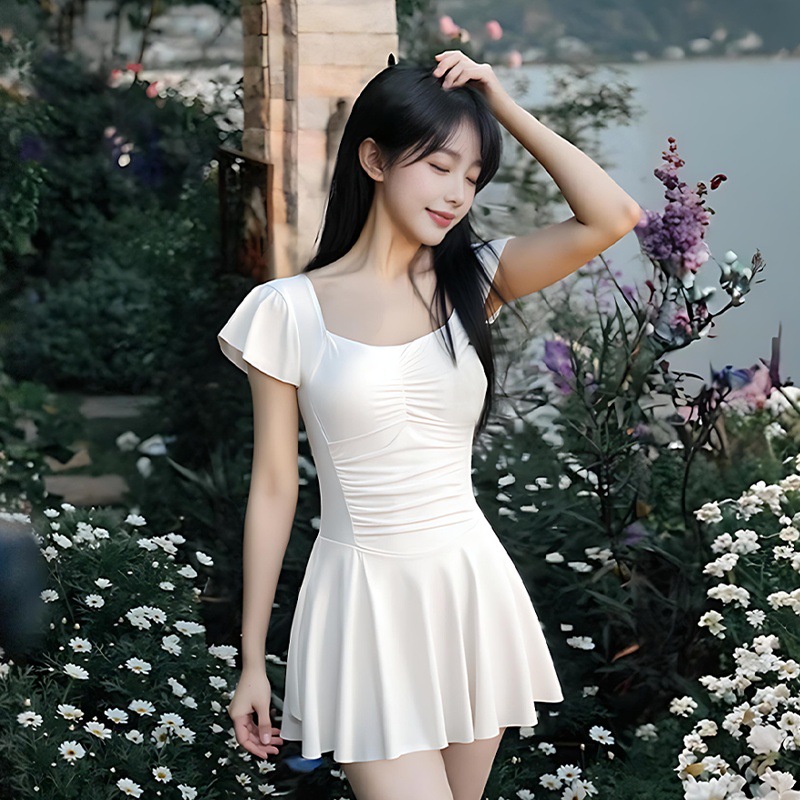 2025 nuevo traje de baño de una pieza para mujer verano de alta gama ins de alto valor playa cubierta de carne delgada traje de baño conservador al por mayor