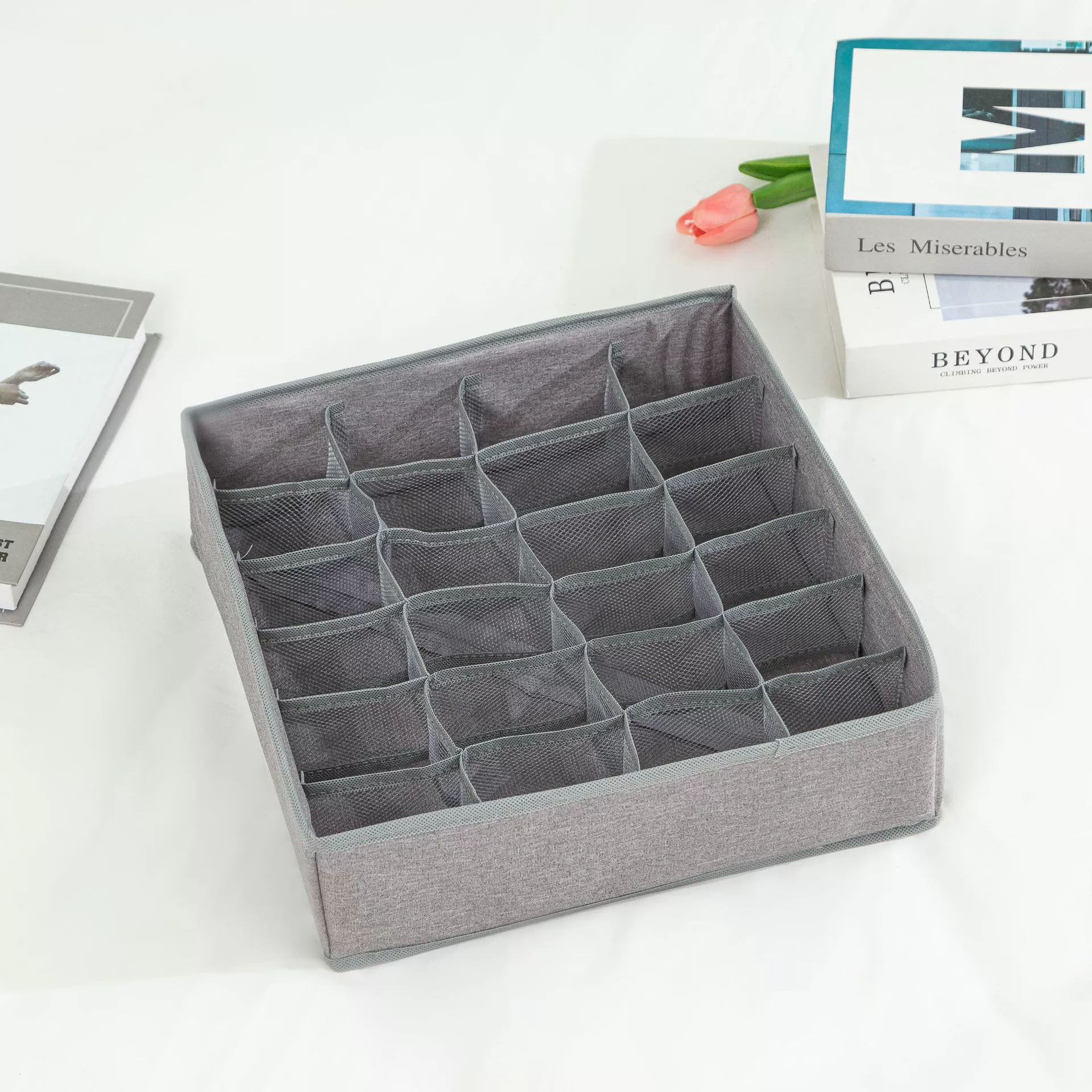 Storage system, underwear, tights, socks, foldable cloth, storage box