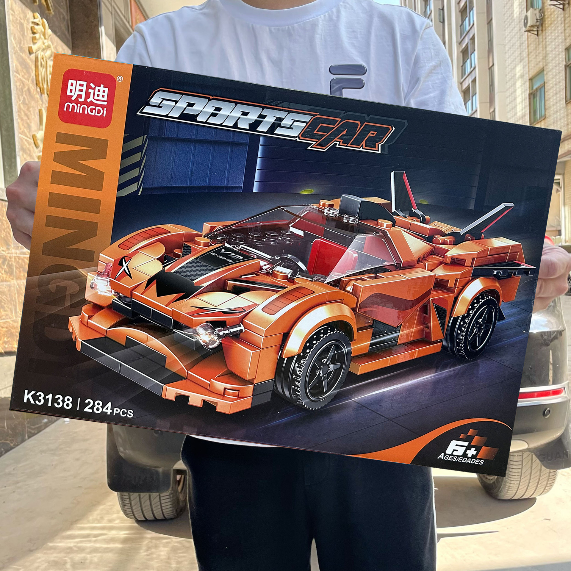 Niños niños puzzle DIY compatible ensamblaje modelo de carreras de partículas pequeñas agencias de juguetes de inscripción caja de regalo al por mayor