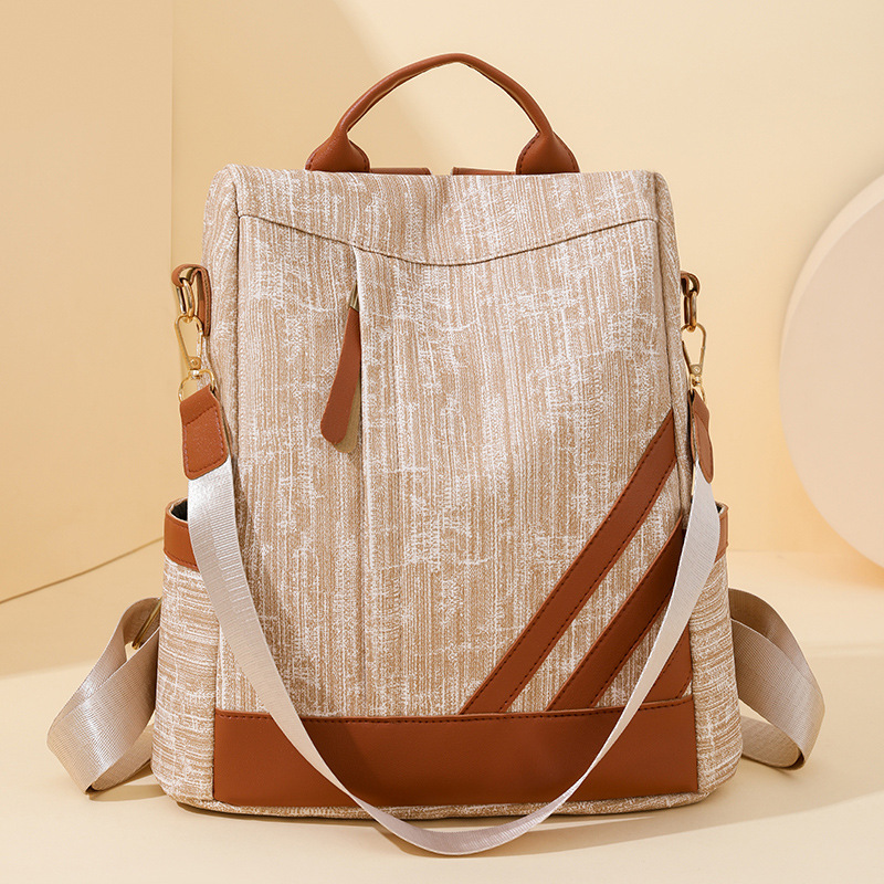 Fábrica al por mayor 2024 nueva mochila coreana para mujer simple y versátil mochila de un solo hombro de viaje en color de contraste de gran capacidad