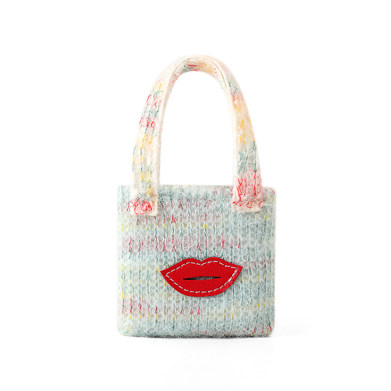 Bolso de almacenamiento de auriculares de felpa mini estilo explosivo de comercio exterior, modelo portátil para mujer, almacenamiento de cosméticos de alto valor