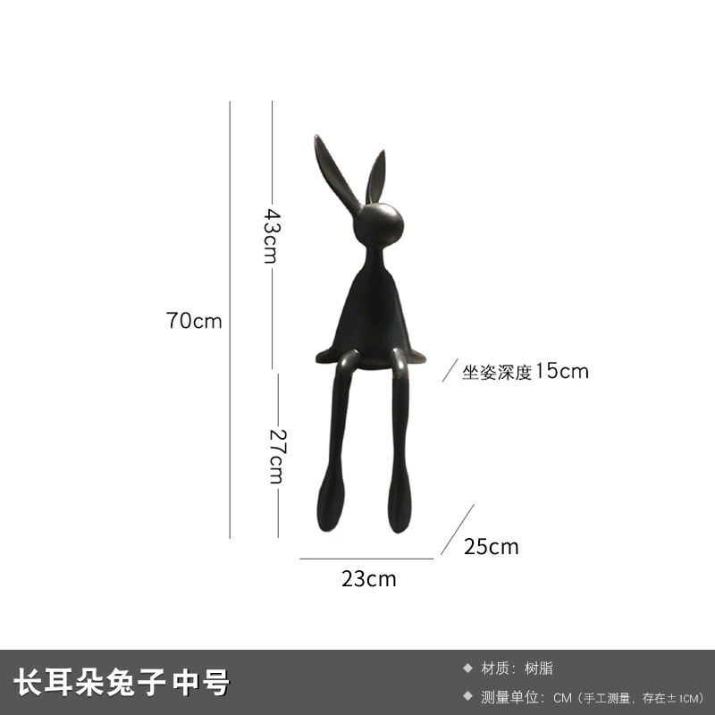 きわめてシンプルな北欧の長い耳の大きい白いウサギの彫刻の置物のサンプルの部屋のリビングルームのテレビの棚の酒場の壁の棚の装飾品|undefined