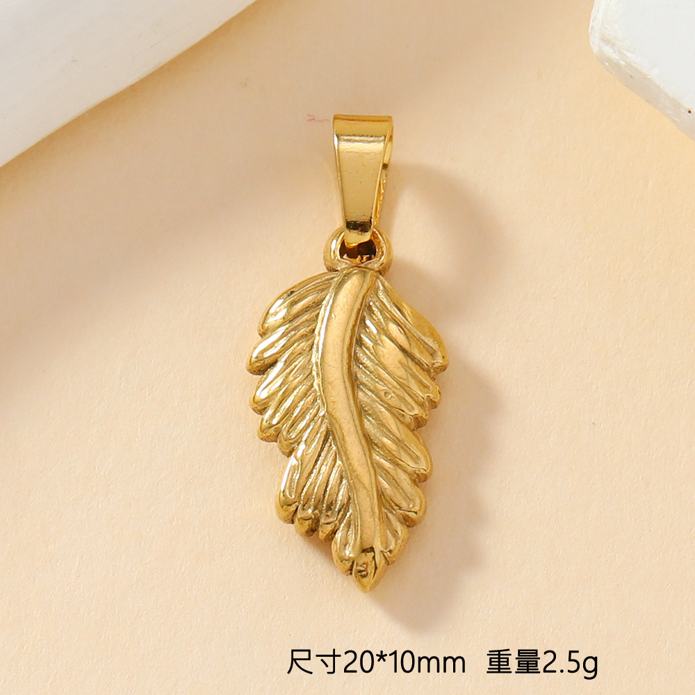 Colgante único Joyas de fundición de acero inoxidable transfronterizas Personalidad Sol Cruz Amor Flor Pluma Joyas Accesorios de bricolaje