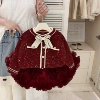 Trendy sweaters and large puffy tutu