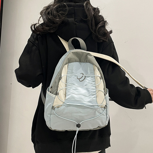 New Japanese niche color matching backpack for women 2024 new sports travel backpack middle and high school student school bag trend